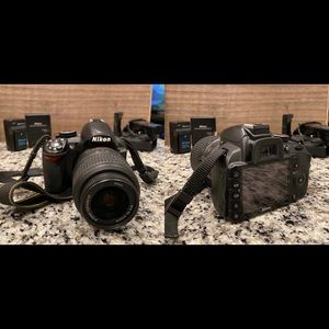 Used Nikon d3100 DSLR camera with battery grip